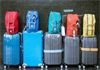 Hành lý máy bay theo kiện hay cân?